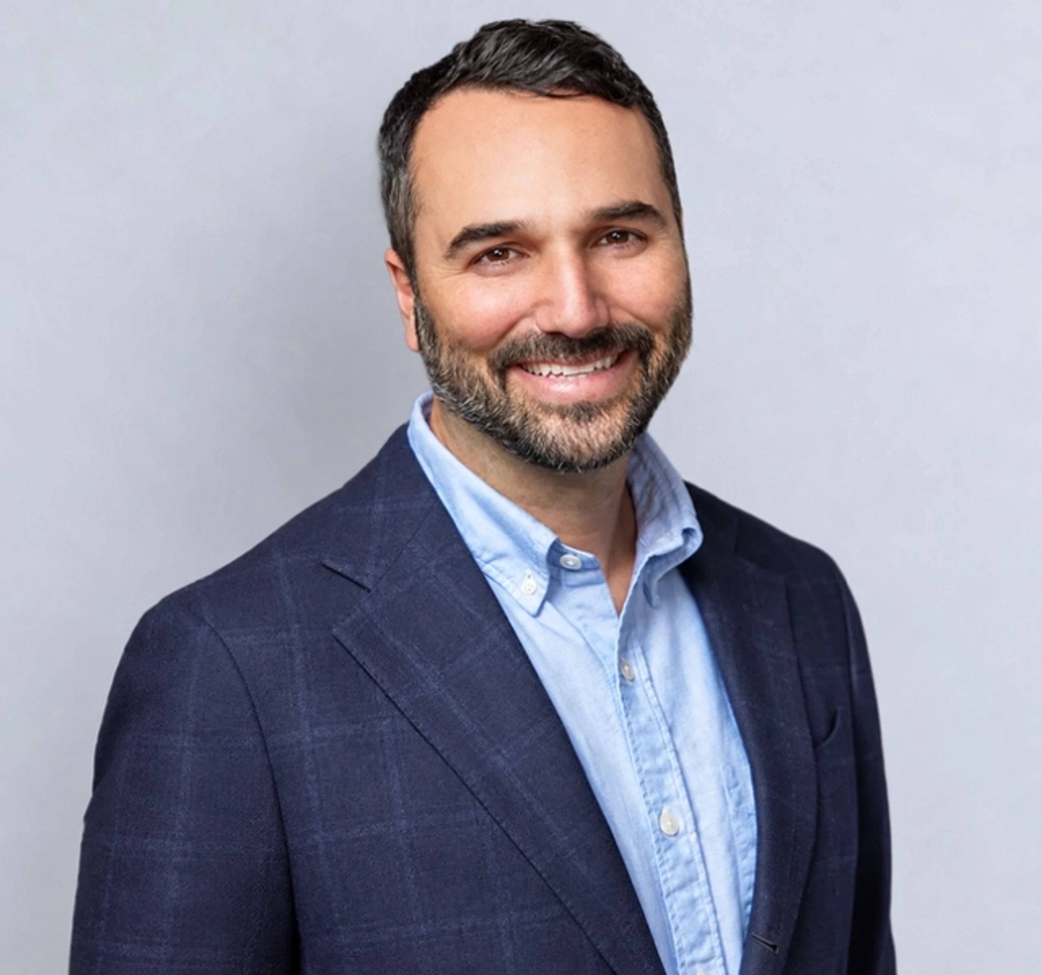 Portrait of Jamie Hodari, Co-Founder and Chief Executive Officer, Industrious; CEO, Building Operations and Experience, CBRE