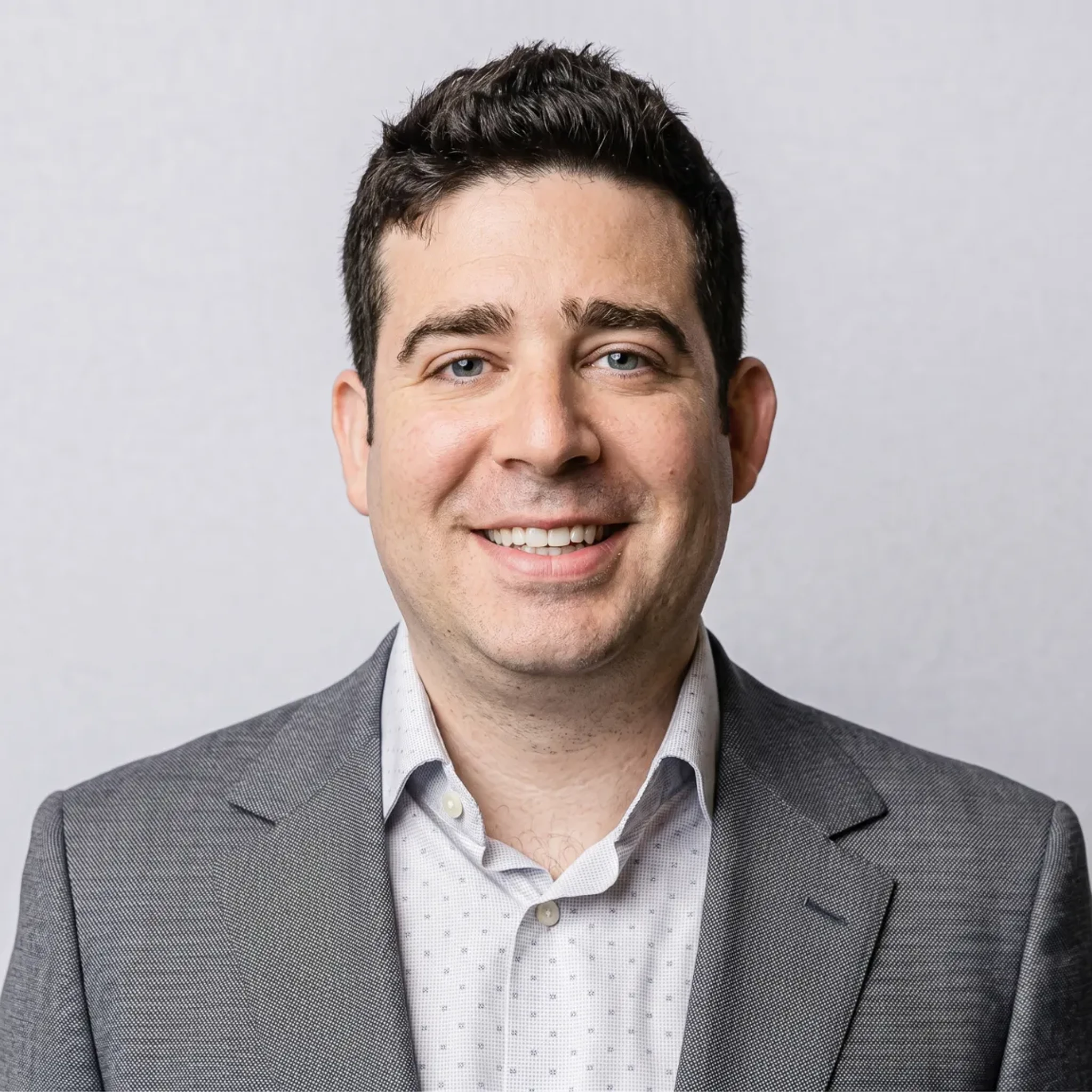 Portrait of Justin Stewart, Co-Founder & Chief Real Estate Investment Officer