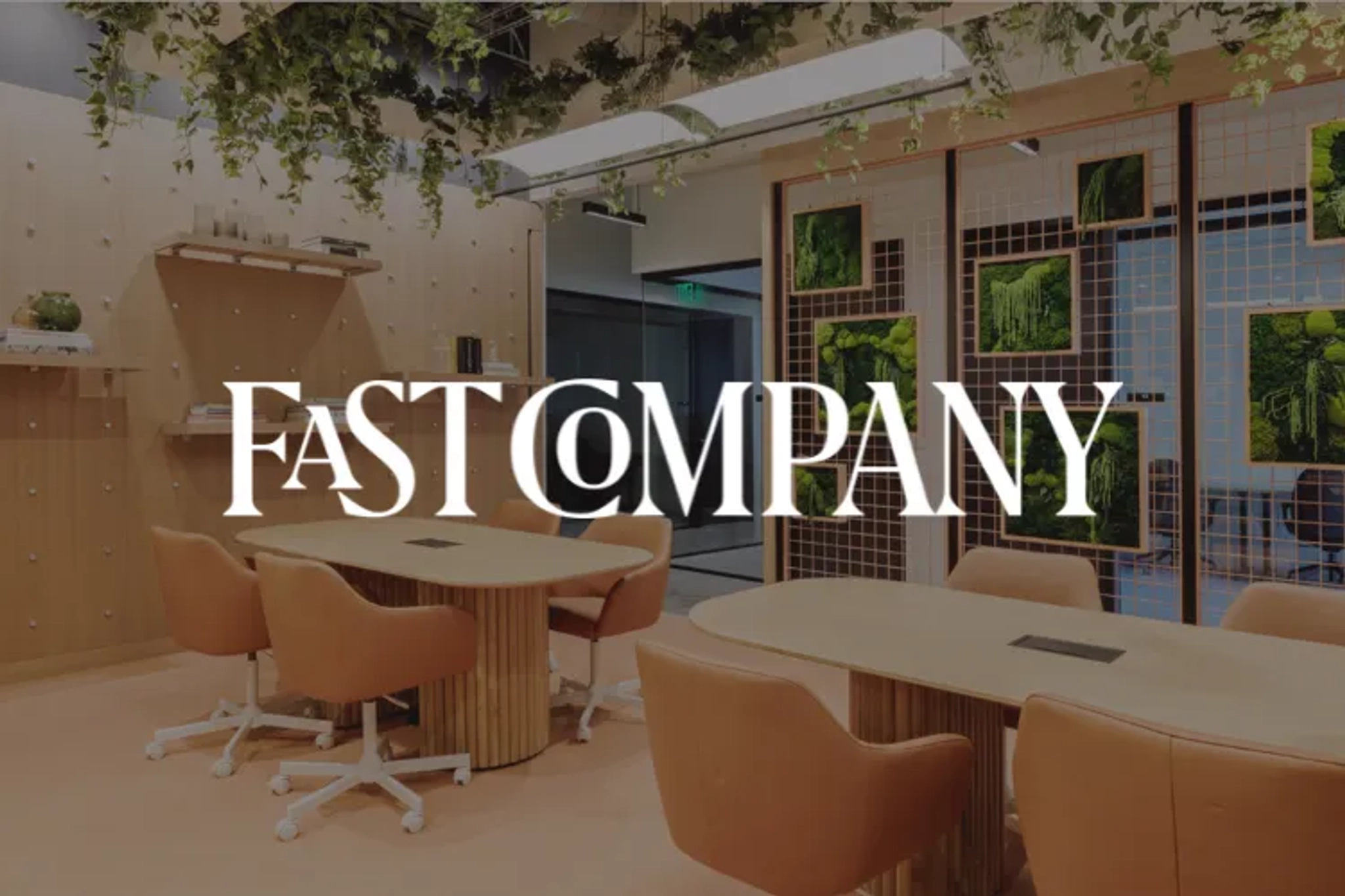 Fast company logo with a picture of an office