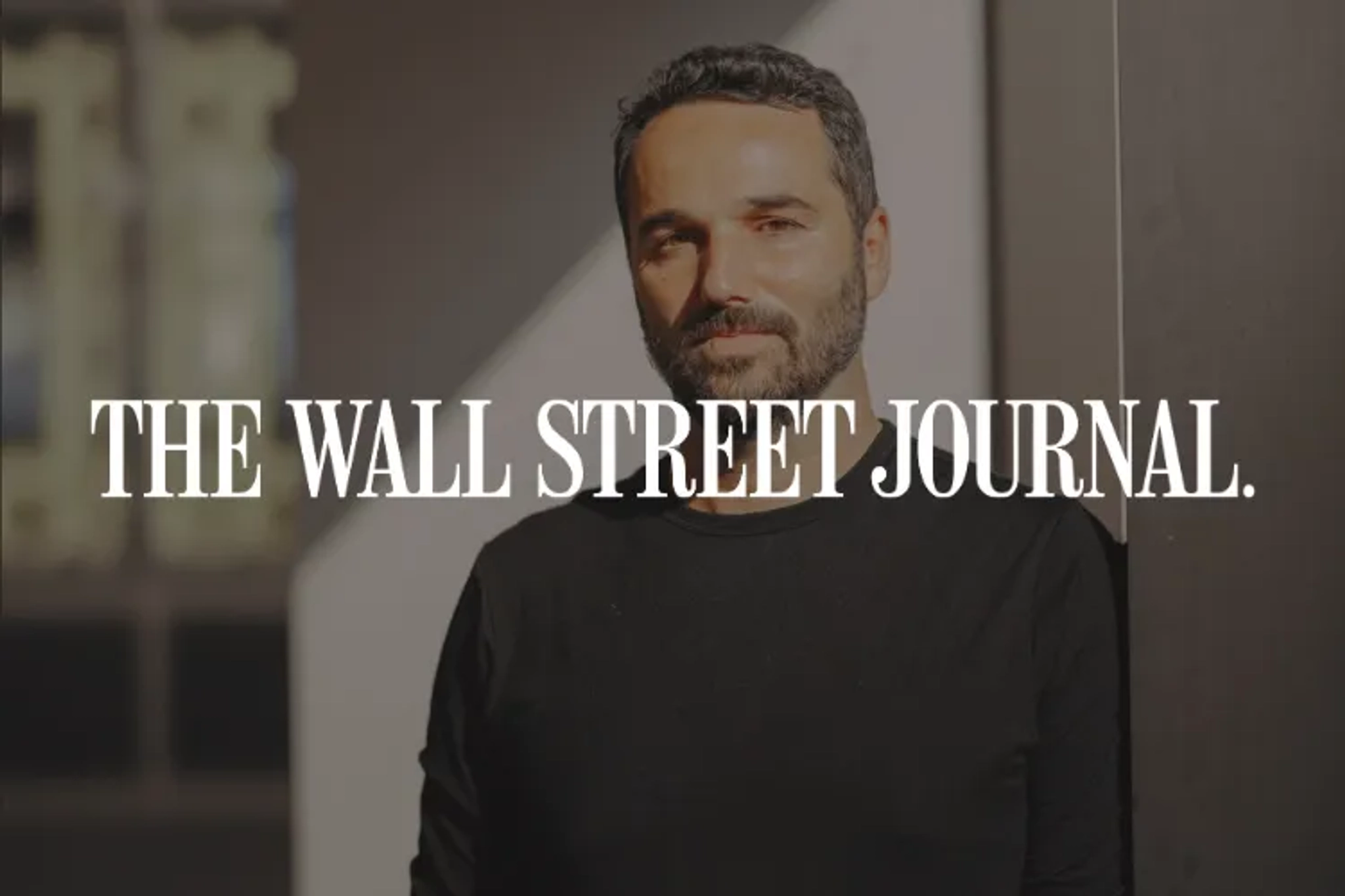 The Wall Street Journal logo with Jamie Hodari in the background